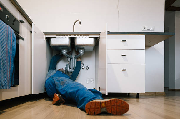 Professional Plumbing technician working in Adelphia, NJ